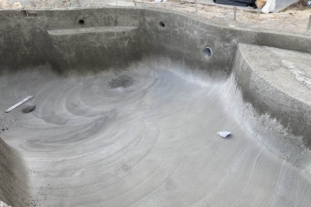 Concrete pools do not typically have liners in them.