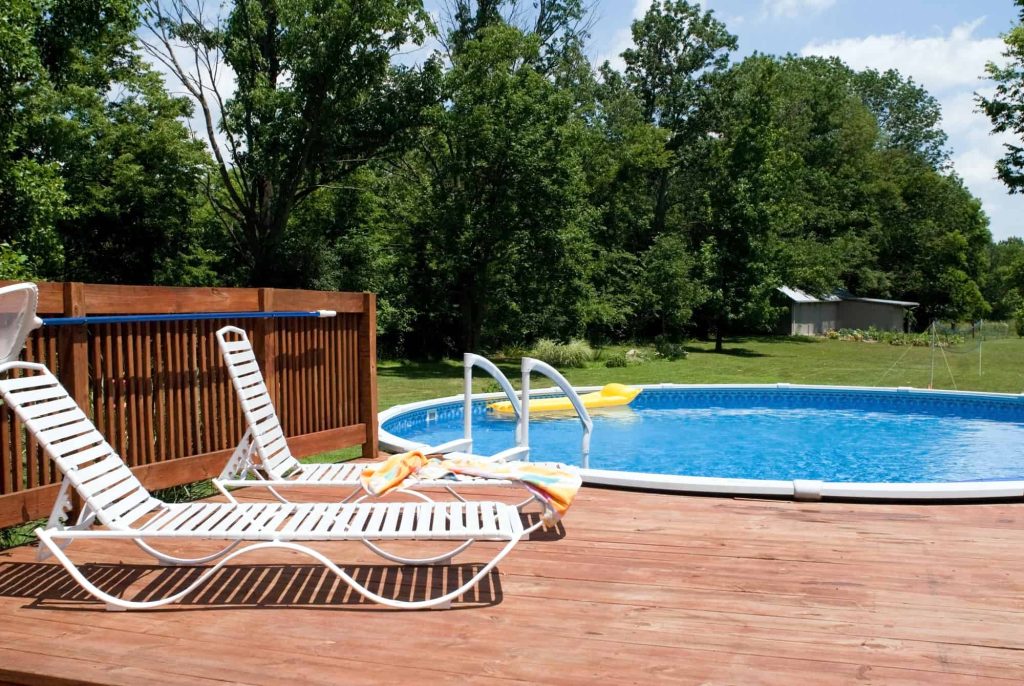 Adding an above ground pool deck makes your yard more appealing.