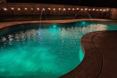Pool deck jets are one of many water features you can add to a pool.