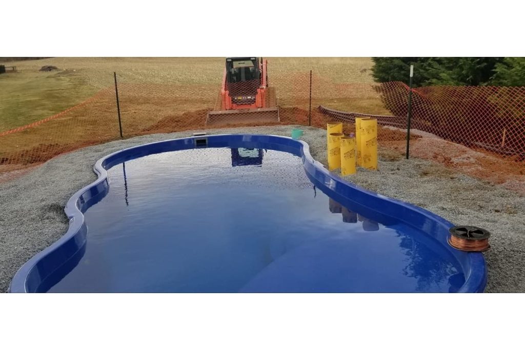 The industry standard for being off-level is up to 1" on fiberglass pools.