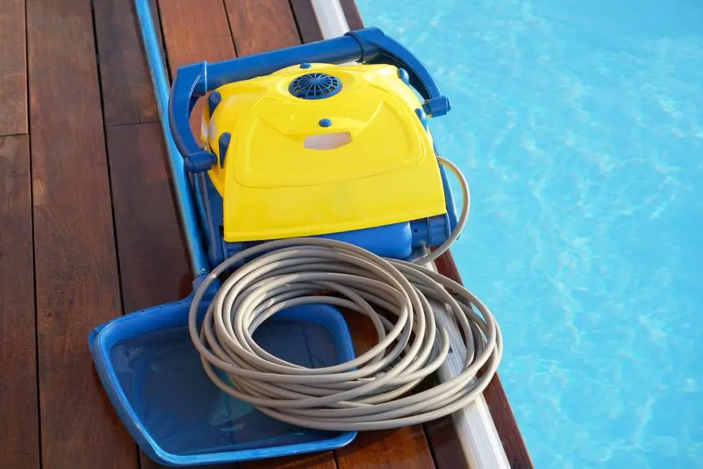 Pool cleaner during his work. Cleaning robot for cleaning the botton of swimming pools.
